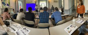 Buffalo Fire Department Captain Marvin Spates instructs Community Orientation attendees on how to use a fire extinguisher