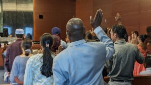 New Americans taking the oath of citizenship