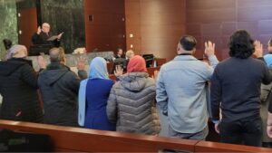 New Americans taking the oath of citizenship 