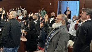 New Americans taking the oath of citizenship 