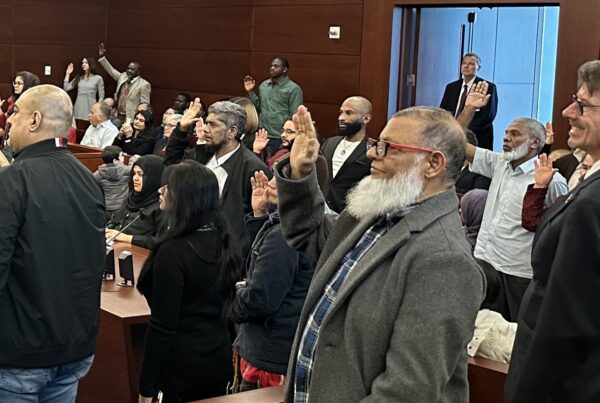 New Americans taking the oath of citizenship